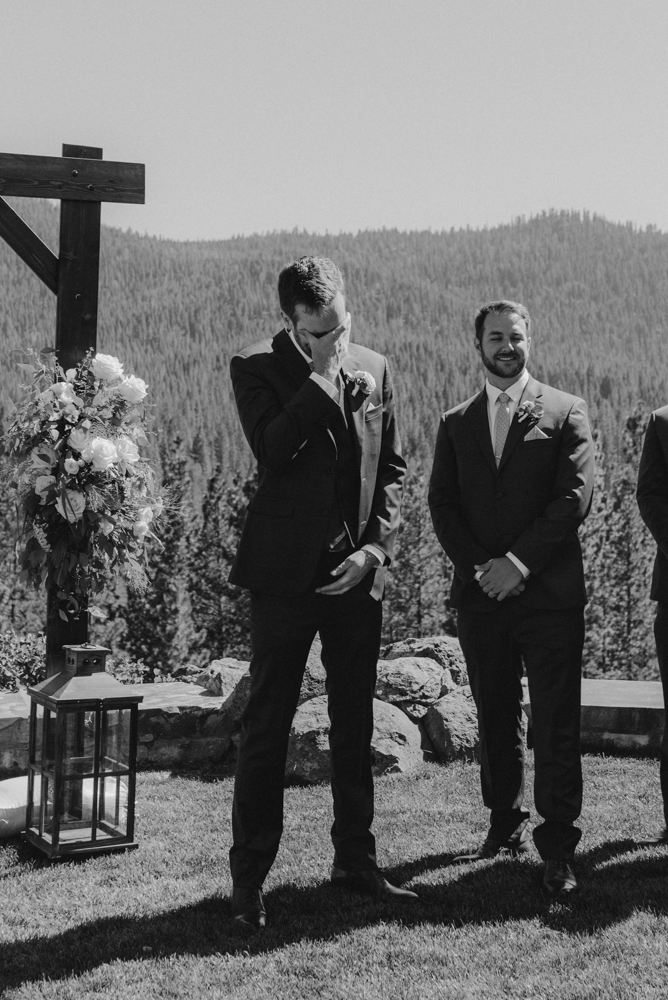 Martis Camp Wedding, groom tearing up after seeing his bride for the first time photo