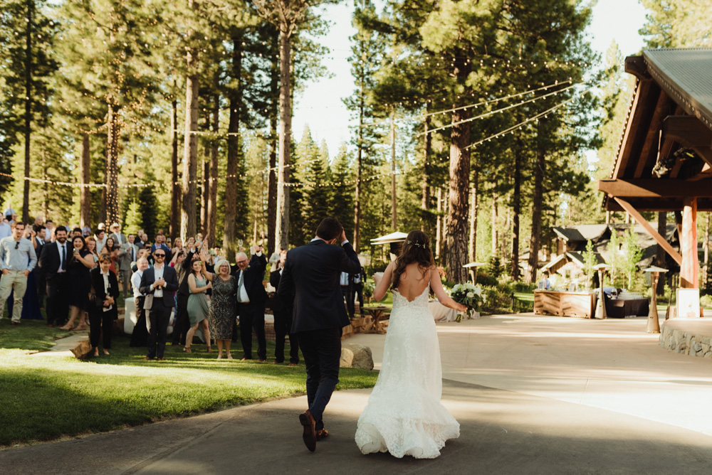Martis Camp Wedding, couple walking in to the reception photo