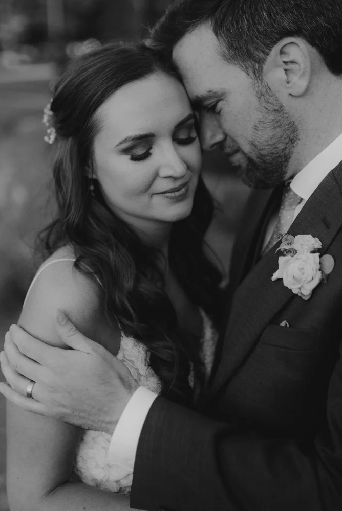 Martis Camp Wedding, couple having a tender romantic moment photo