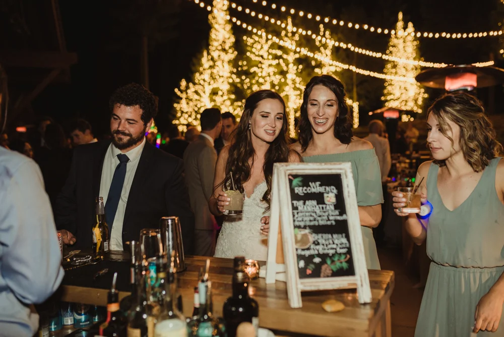 Martis Camp Wedding, bride ordering a drink photo 