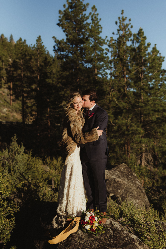 Lake Tahoe Elopement, photo of couple standing on a rock overlooking Tahoe