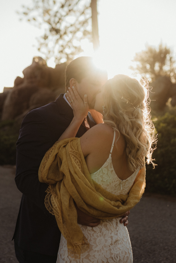 Lake Tahoe Elopement, photo of couple kissing with the sun peaking through