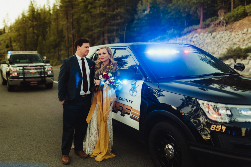 Lake Tahoe Elopement, photo of couple next to a police car