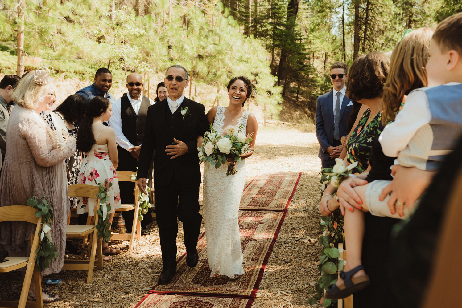 Rush Creek Lodge Wedding, photo of bride walking down the aisle with her dad