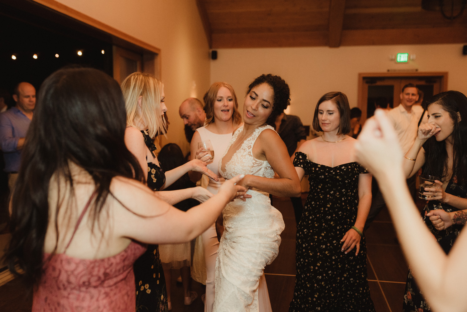 Rush Creek Lodge wedding, bride dancing with her friends photo