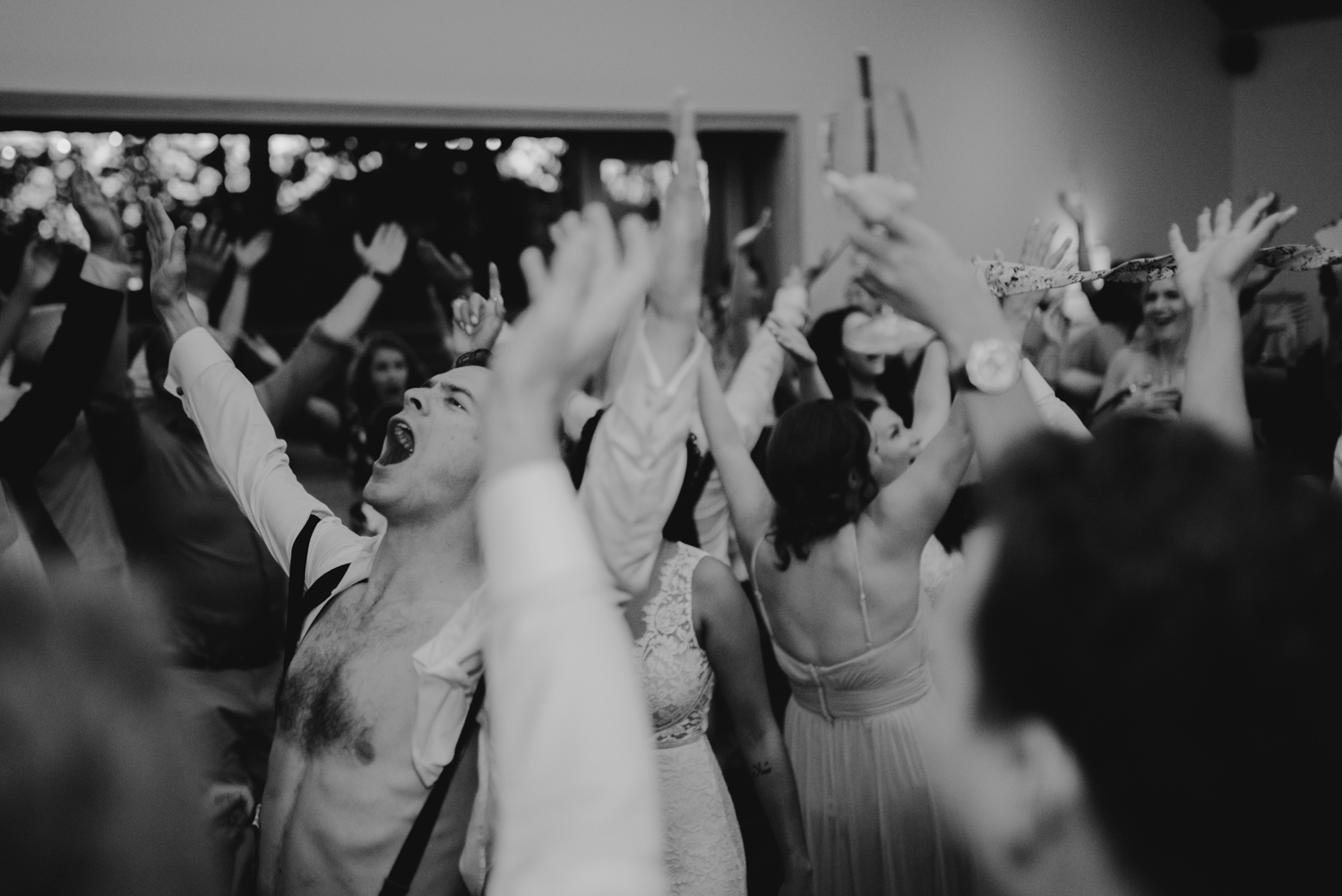 Rush Creek Lodge wedding, friends cheering in the air photo