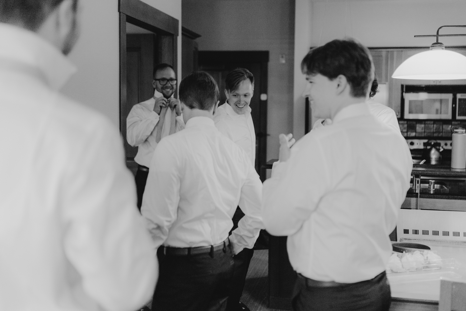 Hellman-Erman Mansion Wedding, photo of groom getting ready with his groomsmen 
