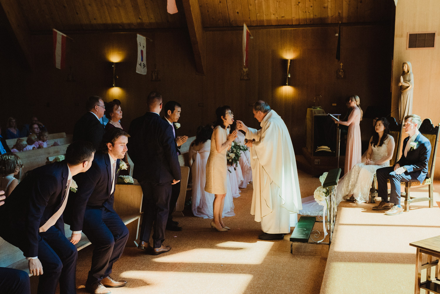 Hellman-Erman Mansion Wedding, photo the brides mom during mass