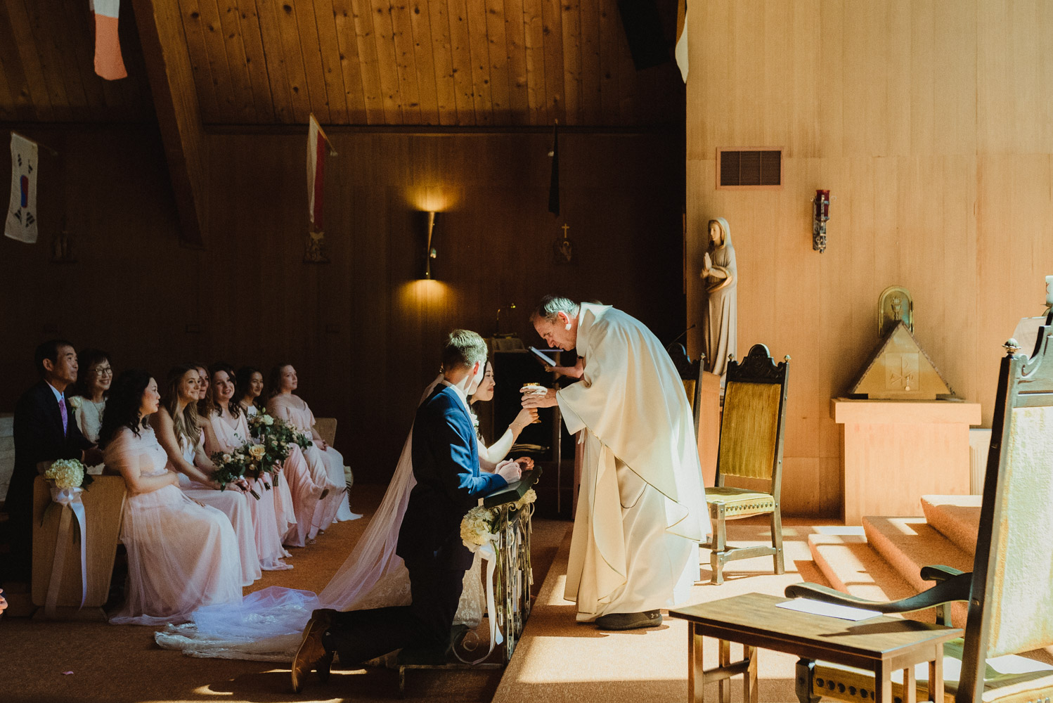 Hellman-Erman Mansion Wedding, photo of couple during their wedding mass