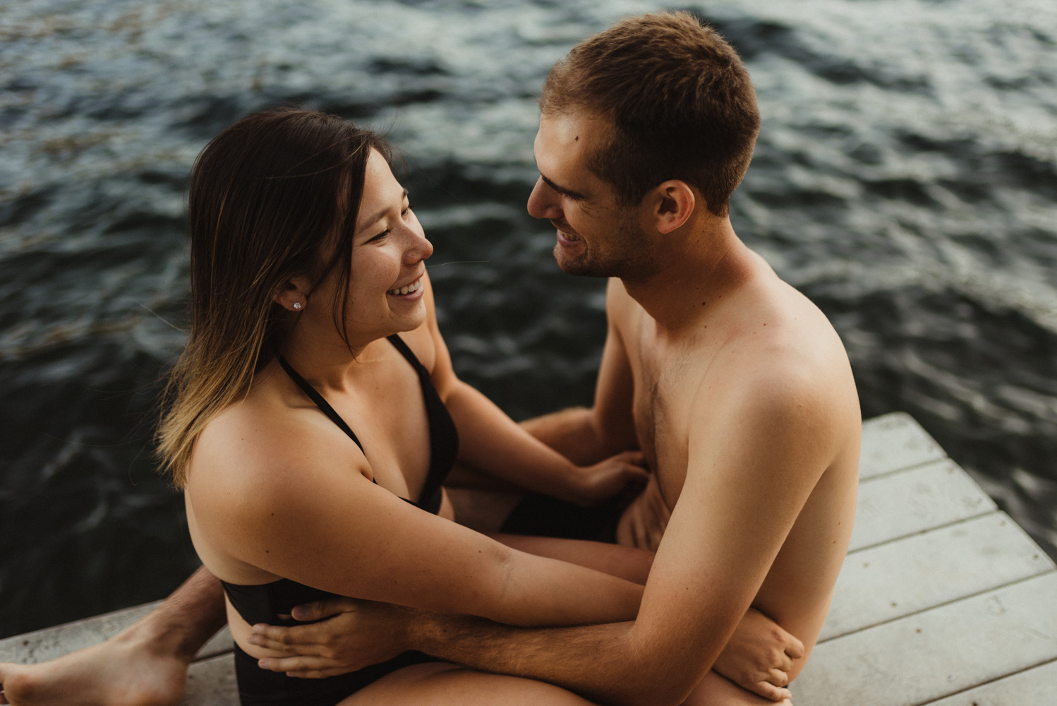 Lake Tahoe Wedding Photographer, photo of couple laughing on the dock