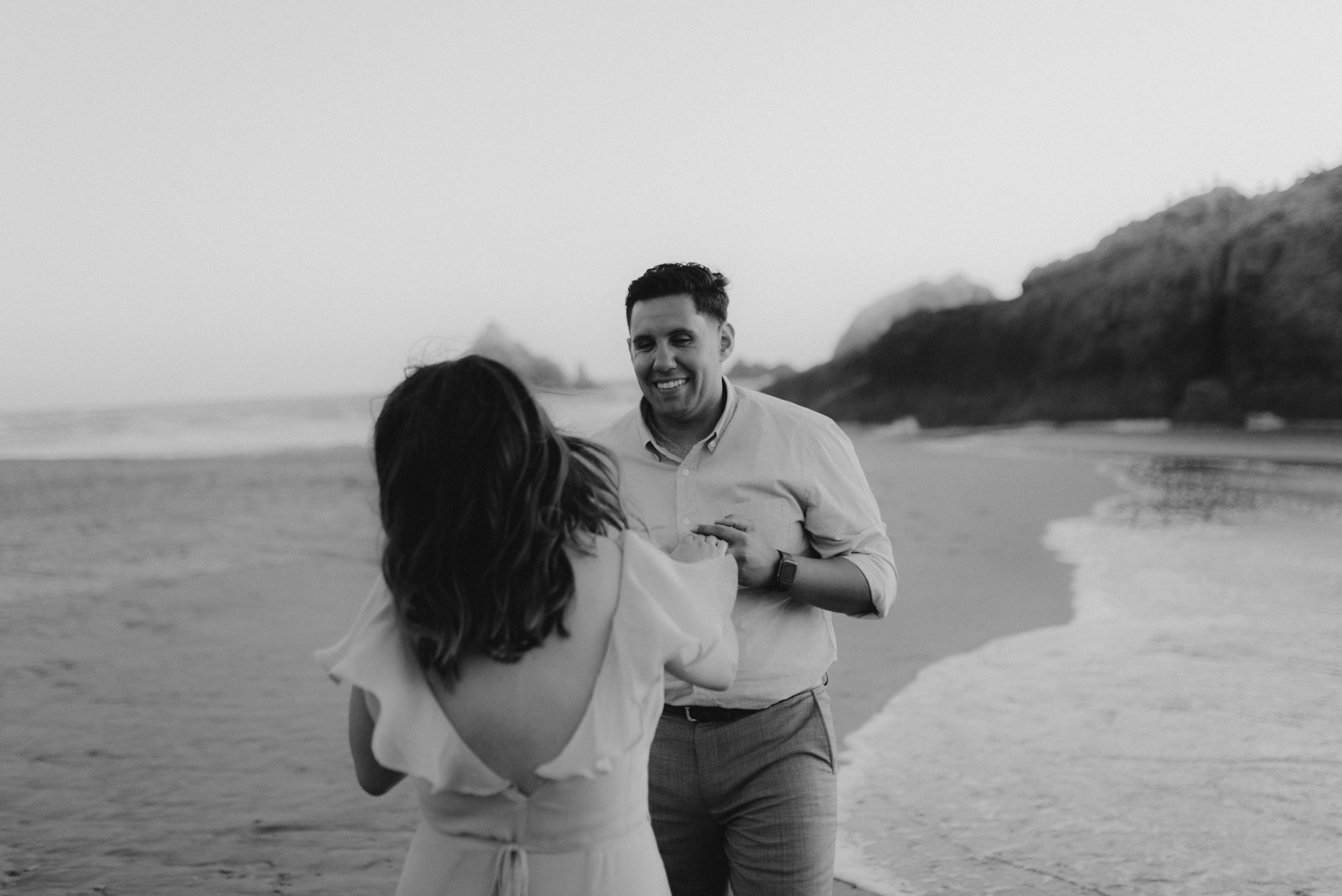 Sutro Baths Engagement Session, photo of guy dancing with a girl