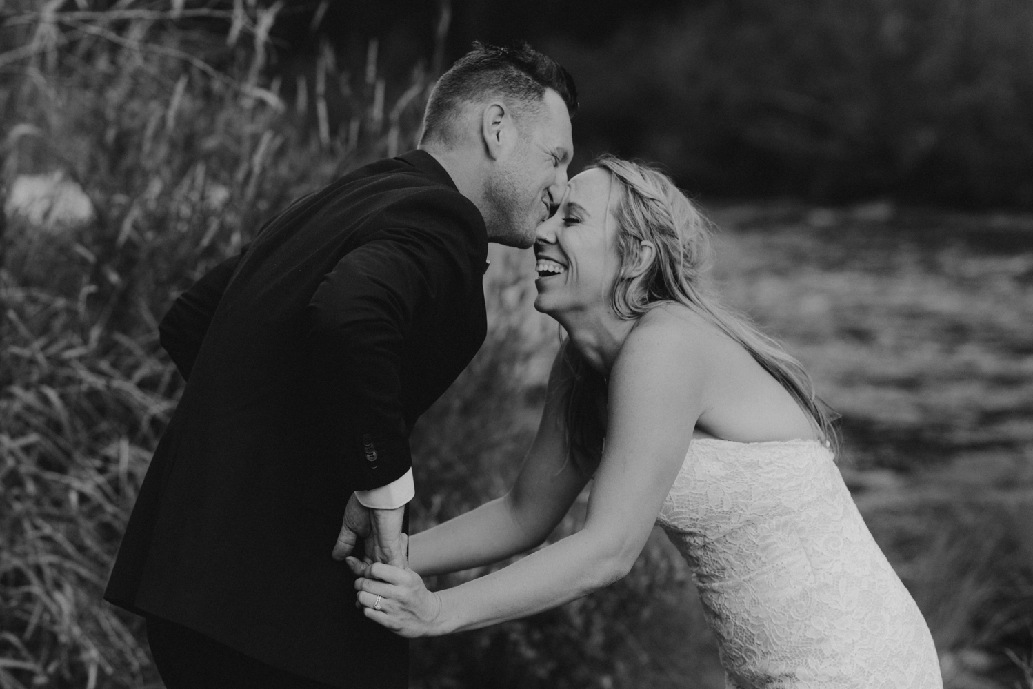 Twenty Mile House Wedding Photographer, photo fo couple laughing 