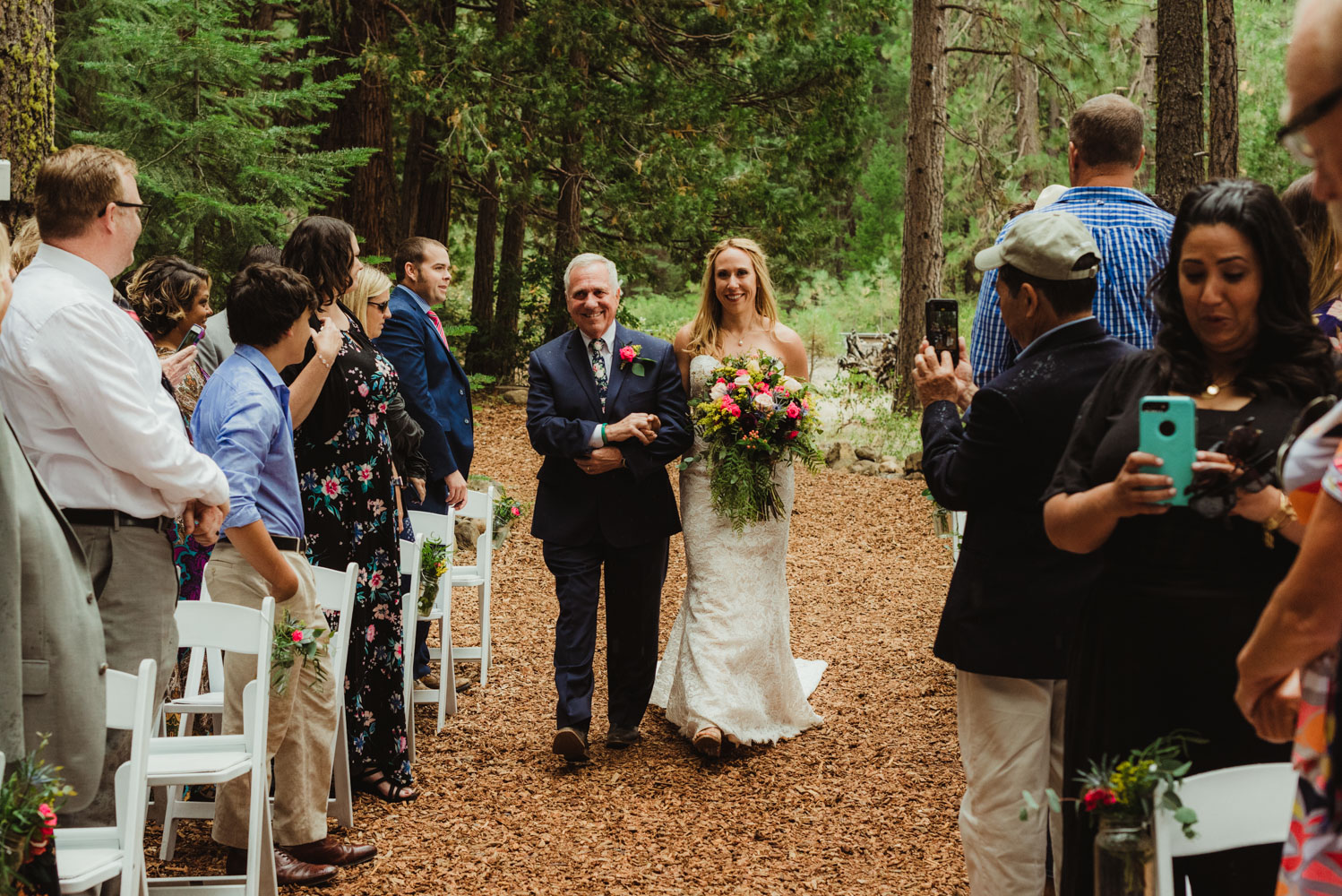 Twenty Mile House Wedding Photographer, bride walking down the aisle with her dad