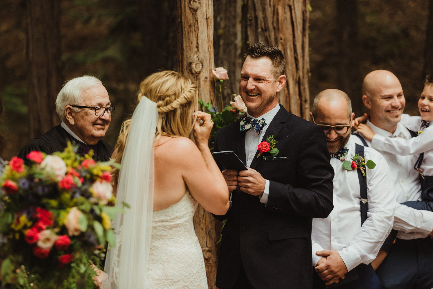Twenty Mile House Wedding Photographer, groom smiling during the ceremony 