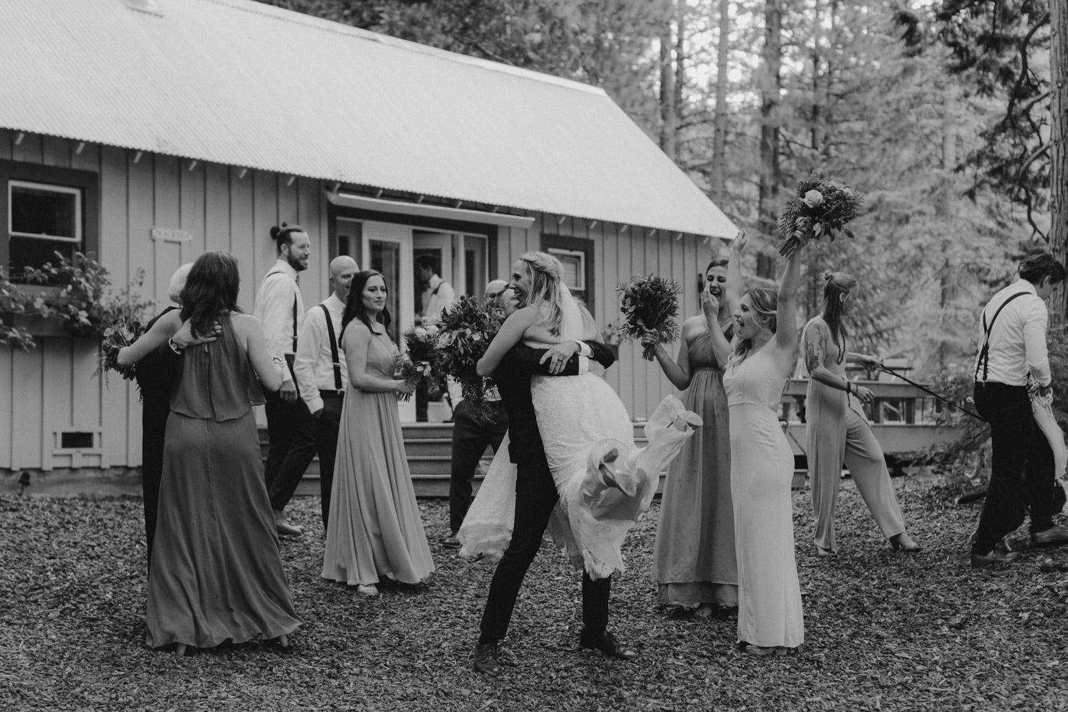 Twenty Mile House Wedding Photographer, bridal party celebrating with brie and groom 