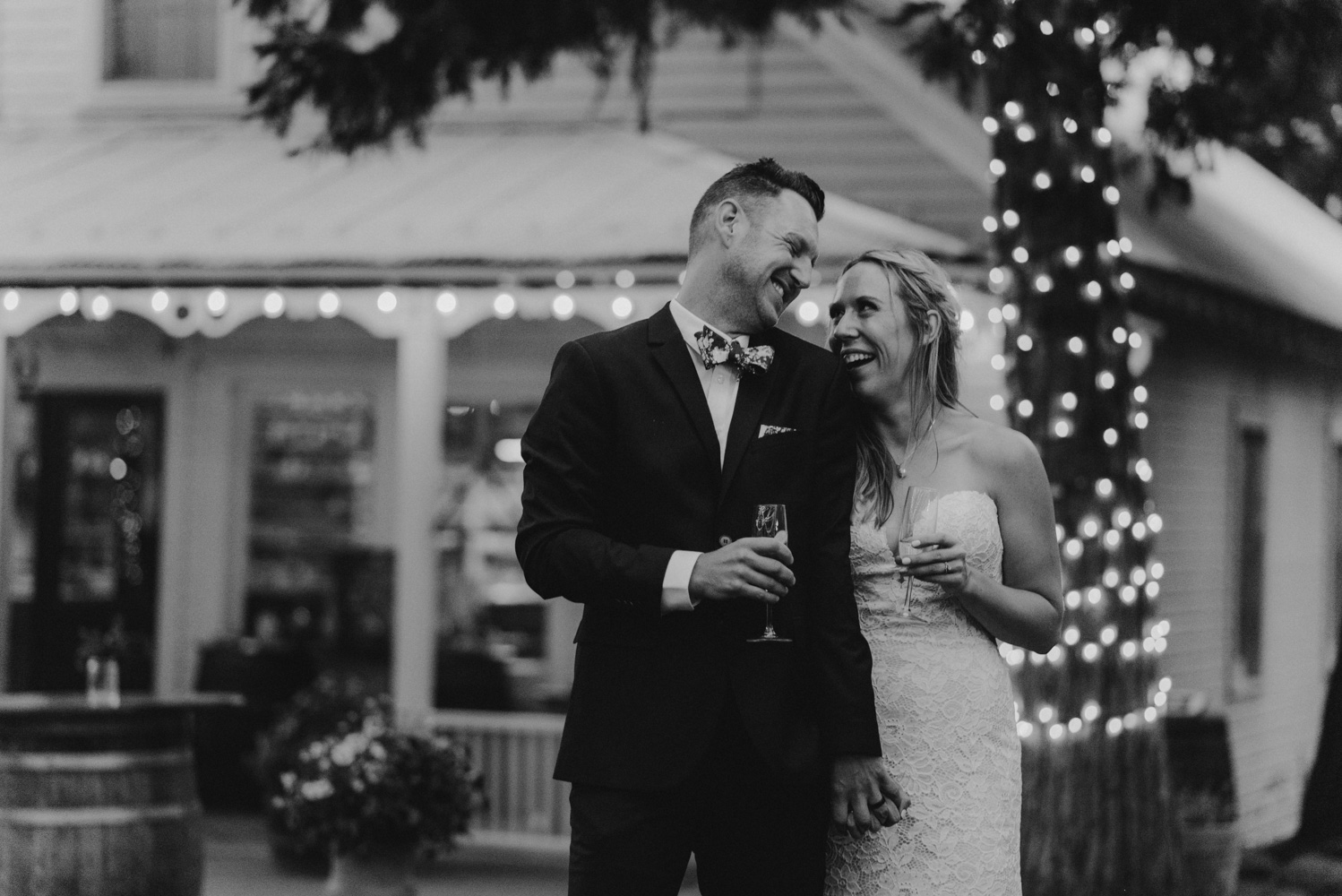 Twenty Mile House Wedding Photographer, couple lauding during toasts
