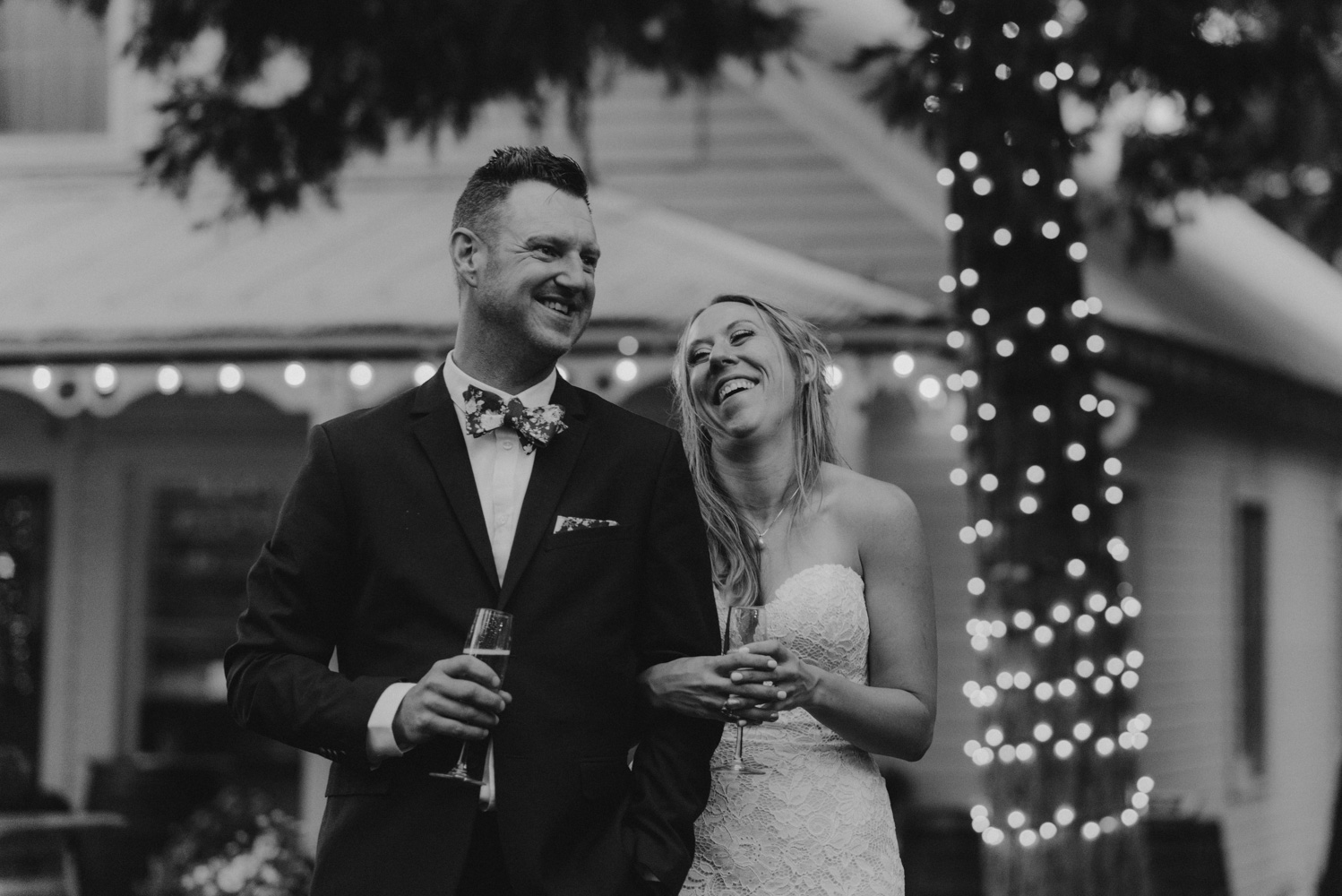 Twenty Mile House Wedding Photographer, couple laughing during the toast