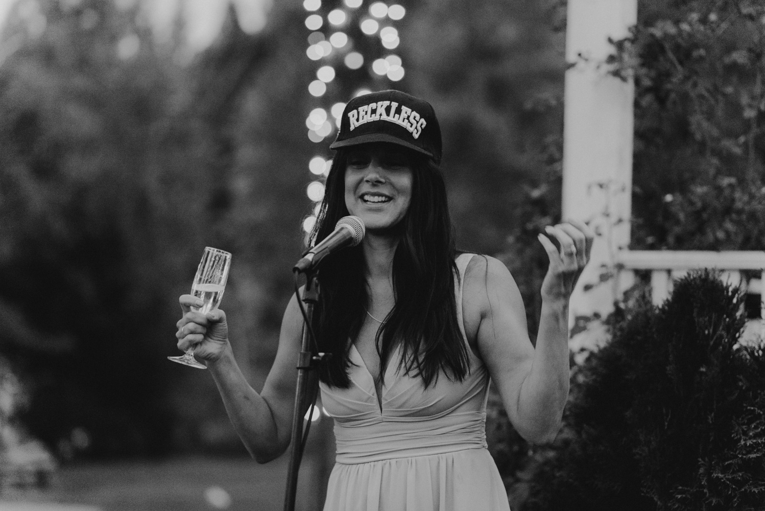 Twenty Mile House Wedding Photographer, bridesmaid wearing a reckless wife hat