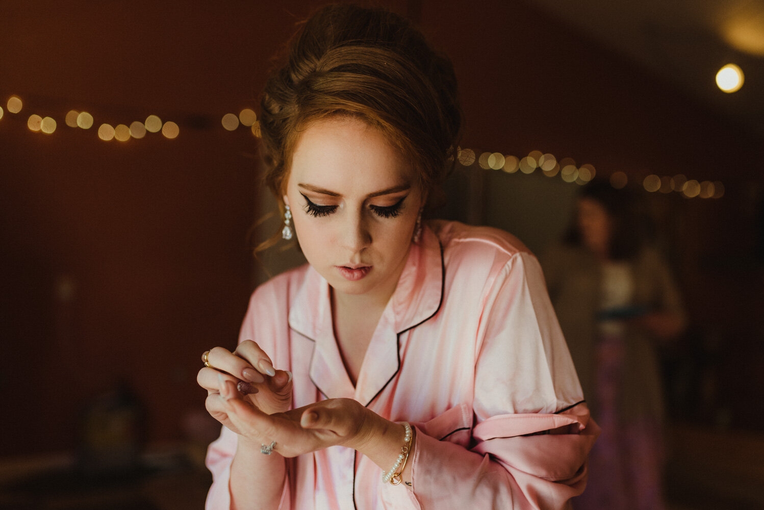 River School Farm Wedding, bride holding her jewelry photo