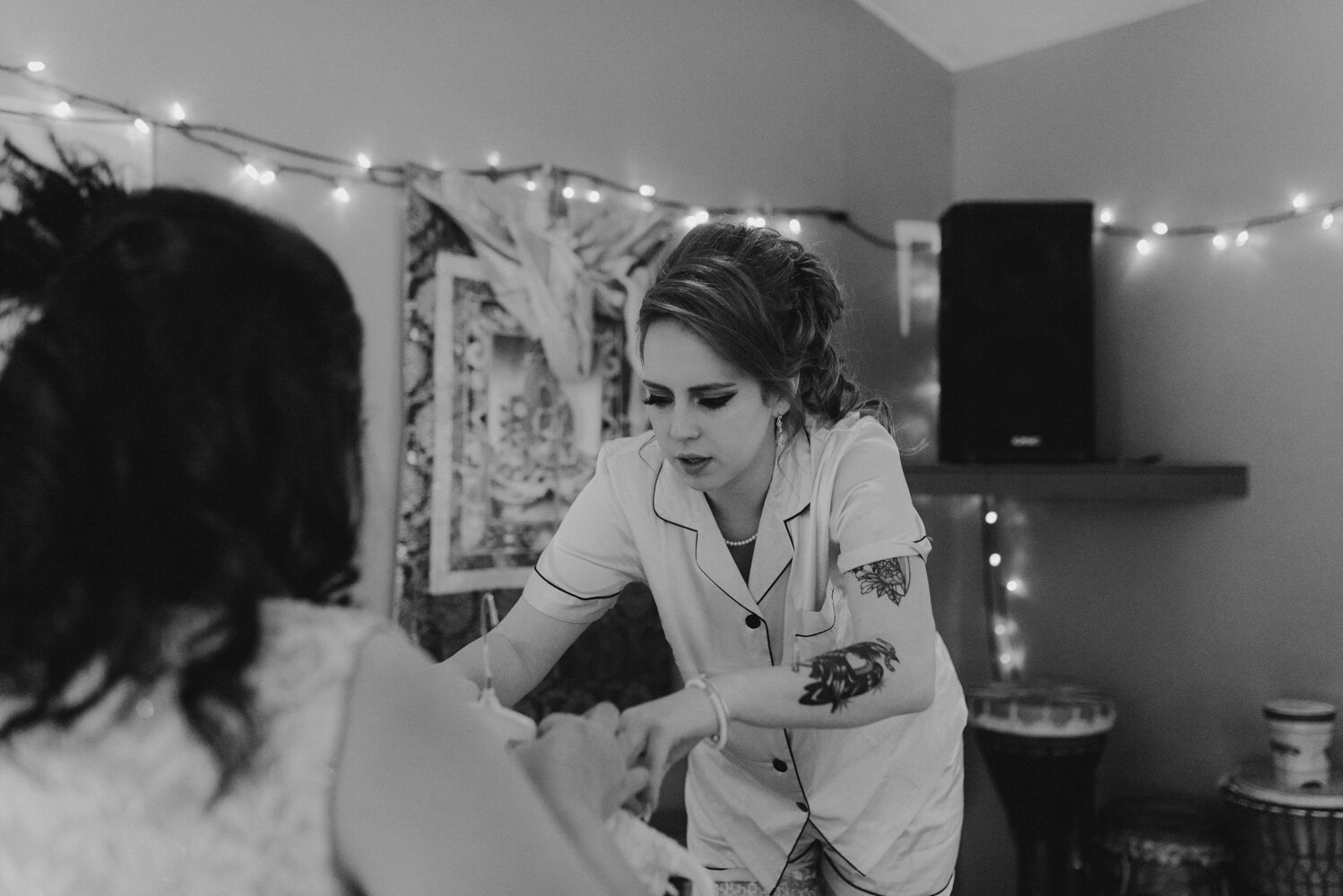 River School Farm Wedding, bride putting on her dress photo 