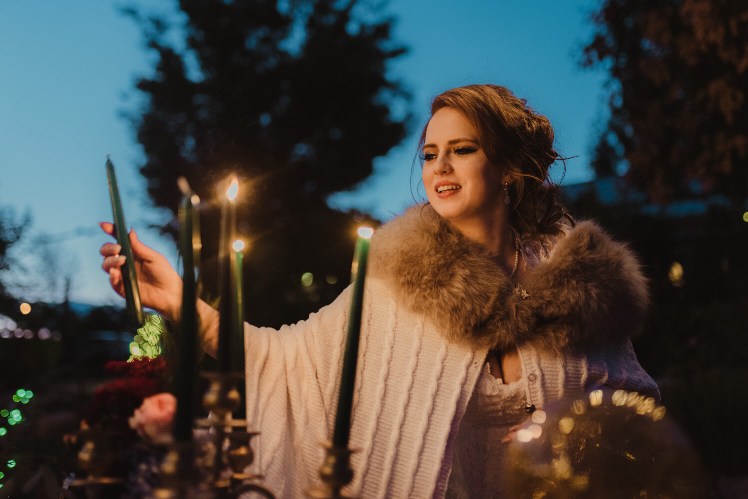 River School Farm Wedding, bride lighting up the candles photo