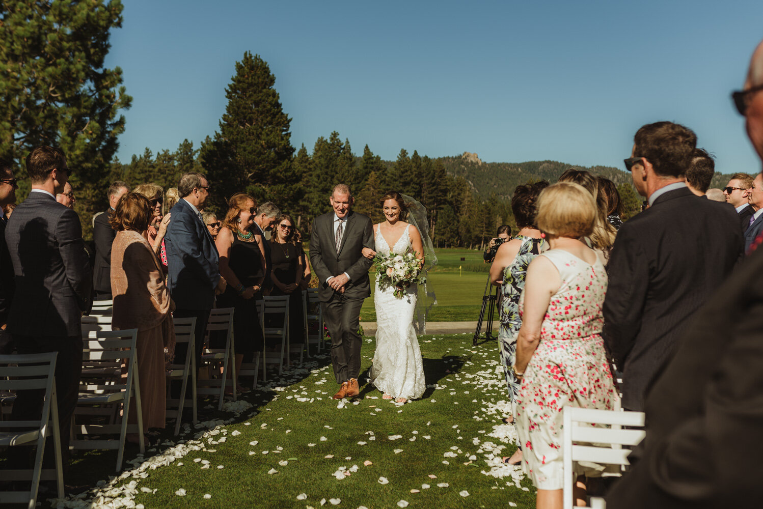 Edgewood Tahoe Wedding, photo of bride and dad walking down the aisle 