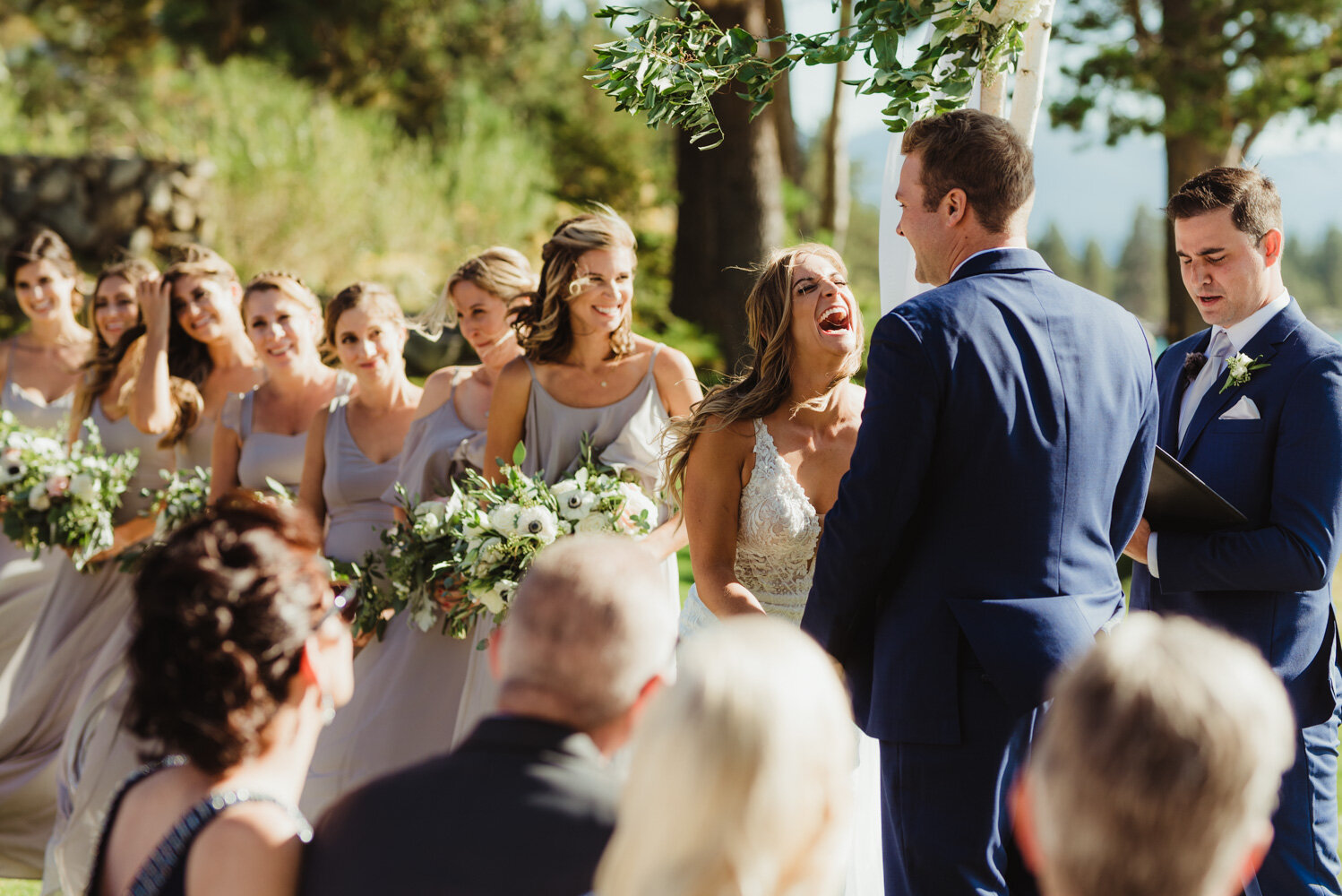 Edgewood Tahoe Wedding, bride laughing during the ceremony photo