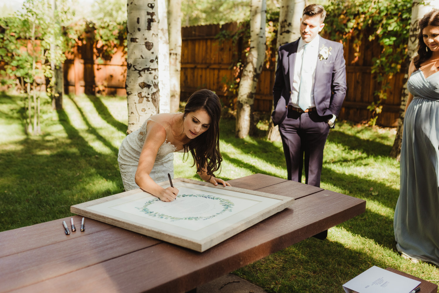 The Chateau Incline Village Wedding, jewish wedding, bride signing Ketubah 