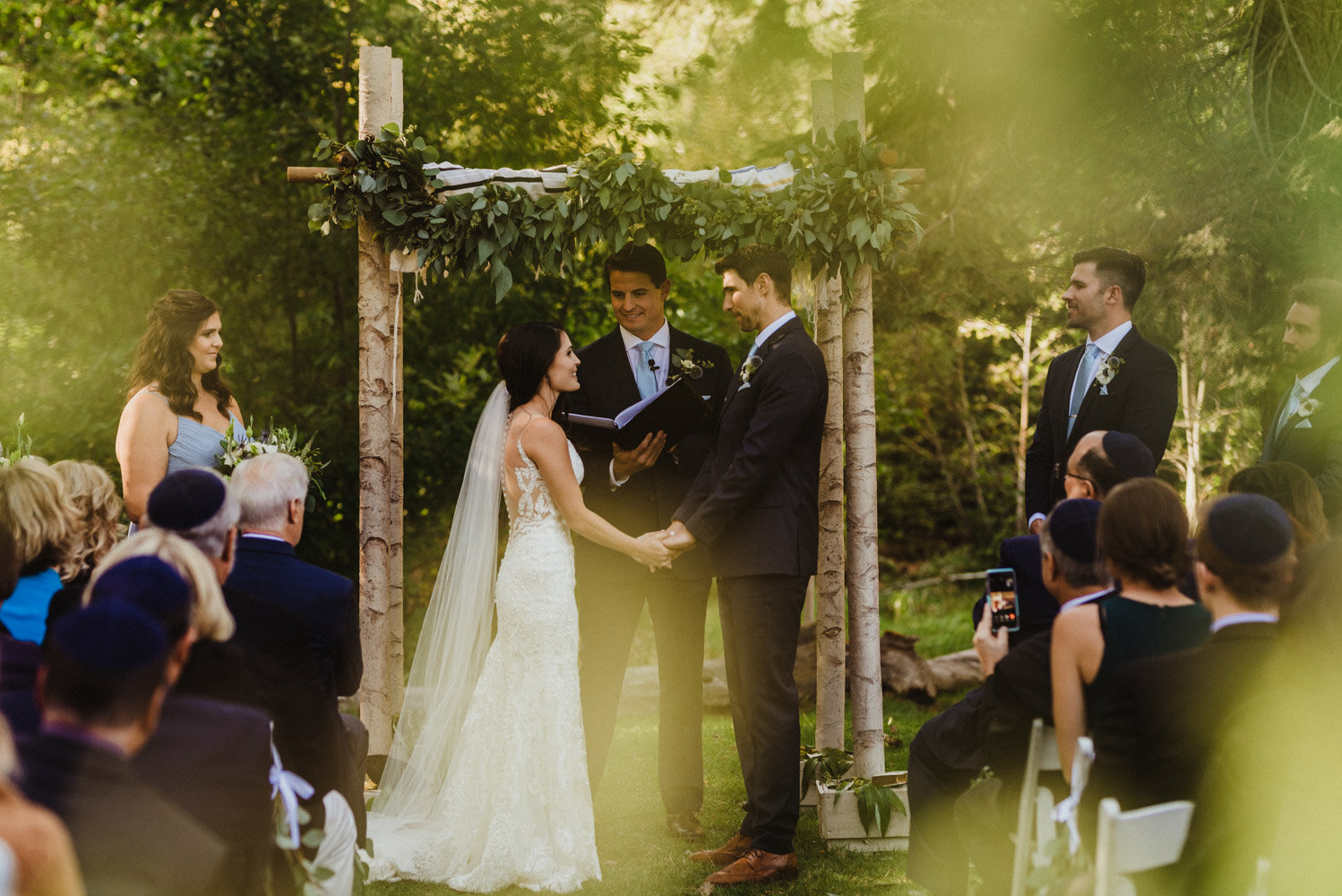 The Chateau Incline Village Wedding, couple being framed by trees photo