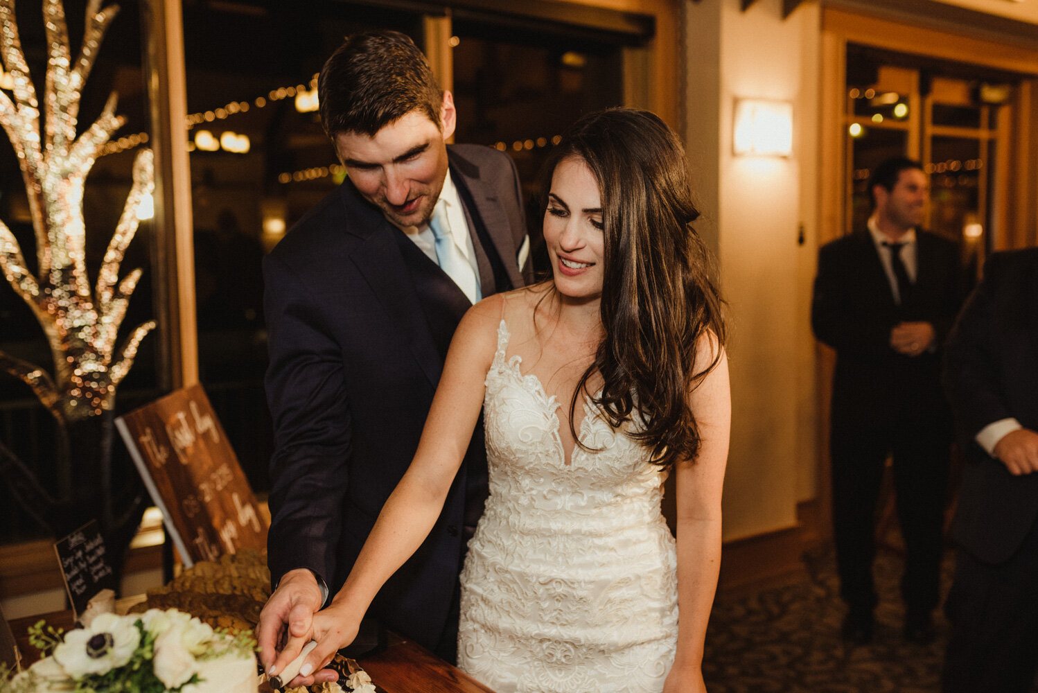 The Chateau Incline Village Wedding, jewish wedding photographer, couple cutting the cake photo