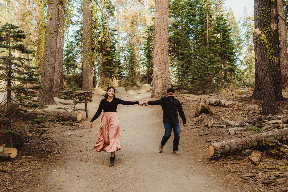 Yosemite Engagement Session, couple holding hands on the taft point trail