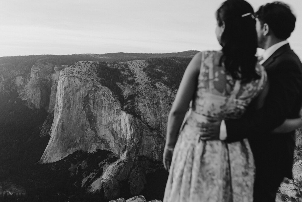 Yosemite Engagement Session, couple hugging with El Capitan in focus 