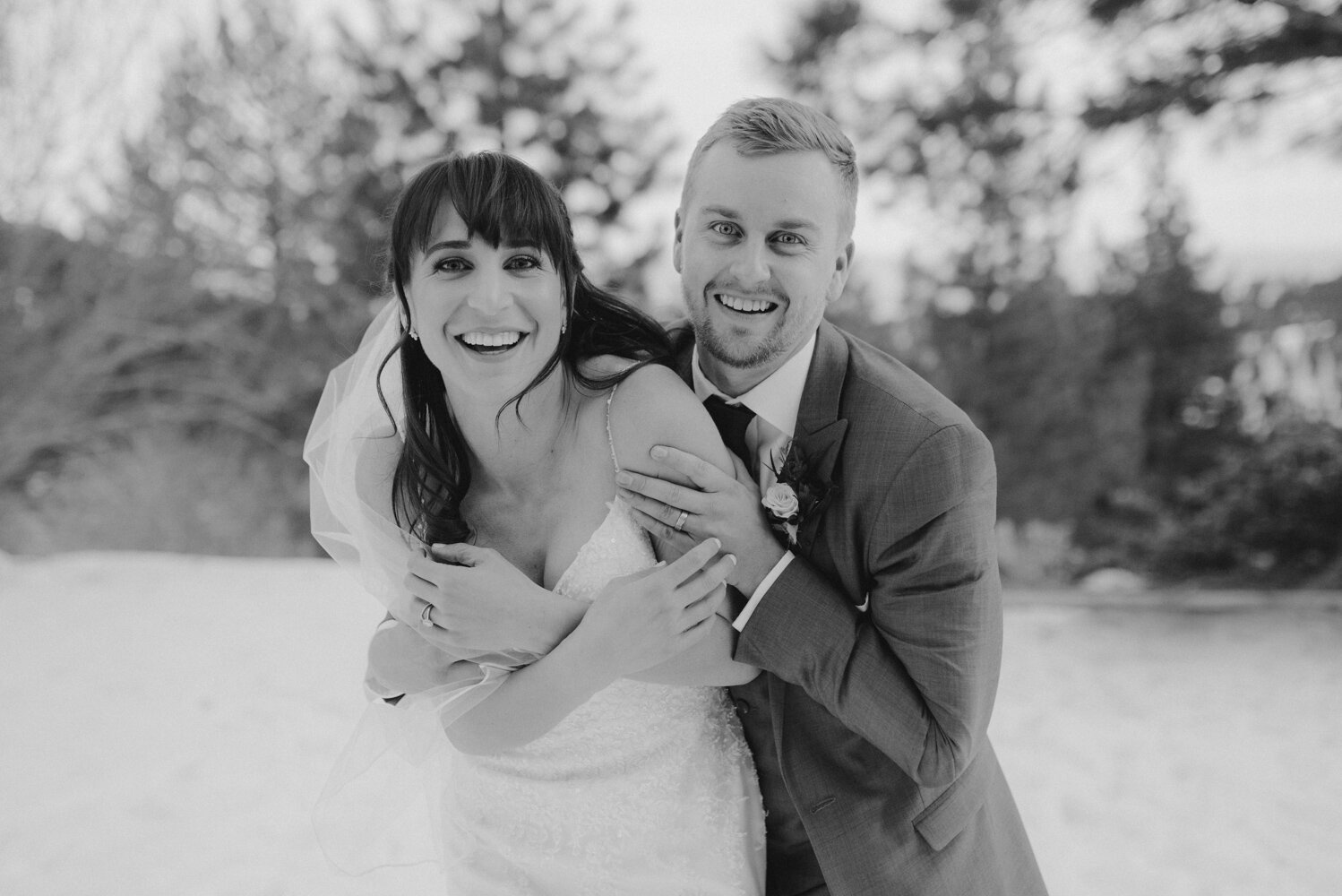 Tannenbaum Winter Wedding, photo of couple laughing 