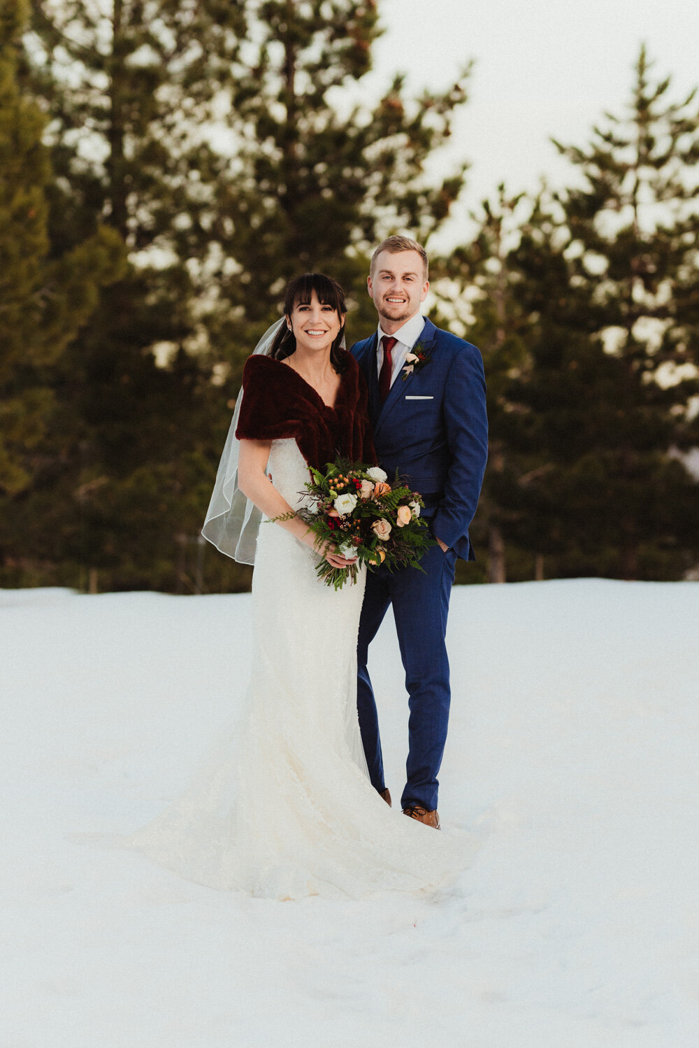 Tannenbaum Winter Wedding, photo of couple smiling at the camera