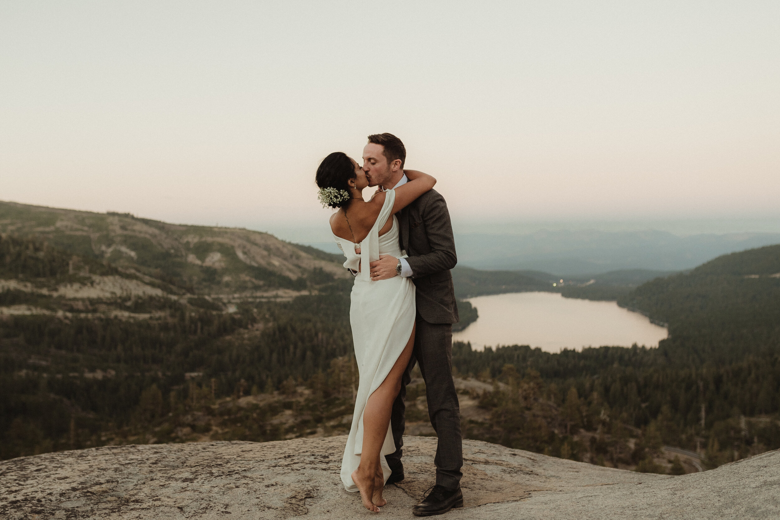 lake tahoe elopement, couple posing in front of a donner lake