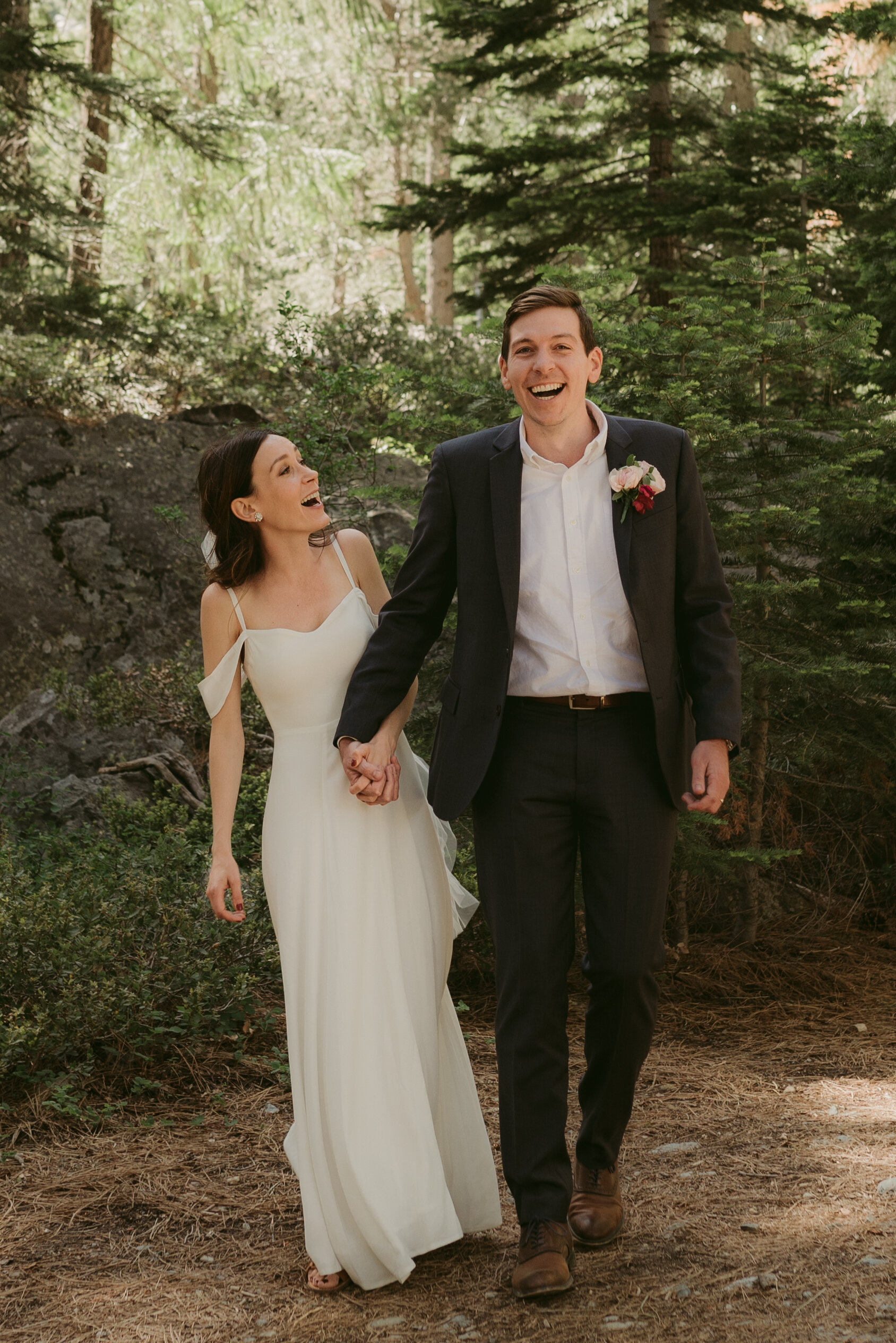lake tahoe elopement, couple walking in the forest photo