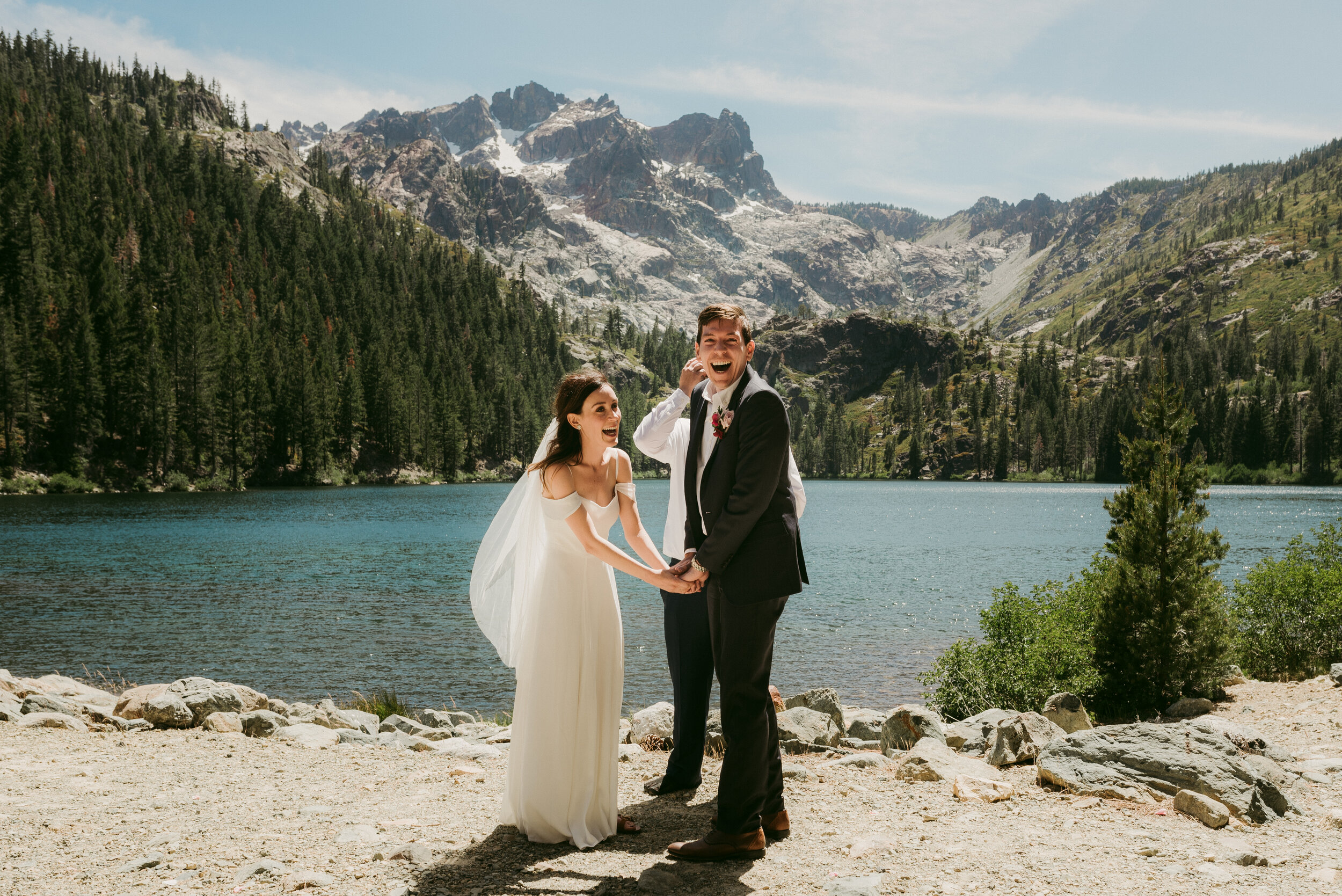 lake tahoe elopement, couple laughing during the ceremony photo