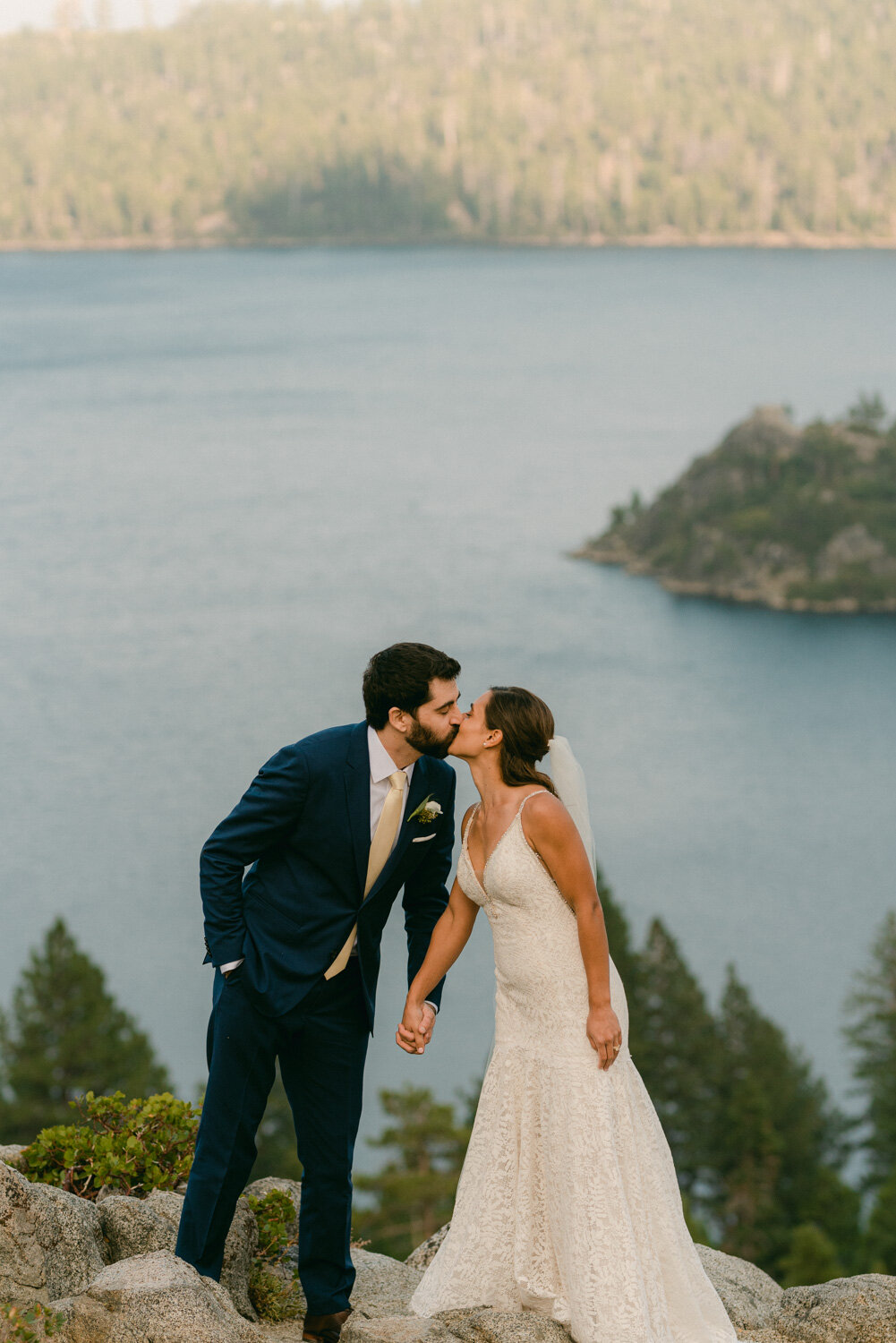 COVID Wedding in Lake Tahoe, couple kissing at emerald bay photo