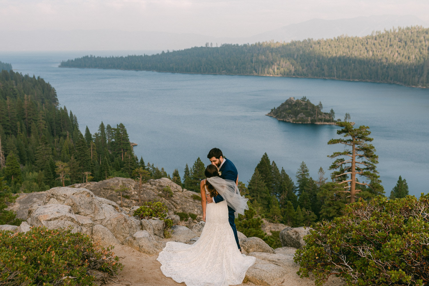 COVID Wedding in Lake Tahoe, couple facing Emerald Bay photo