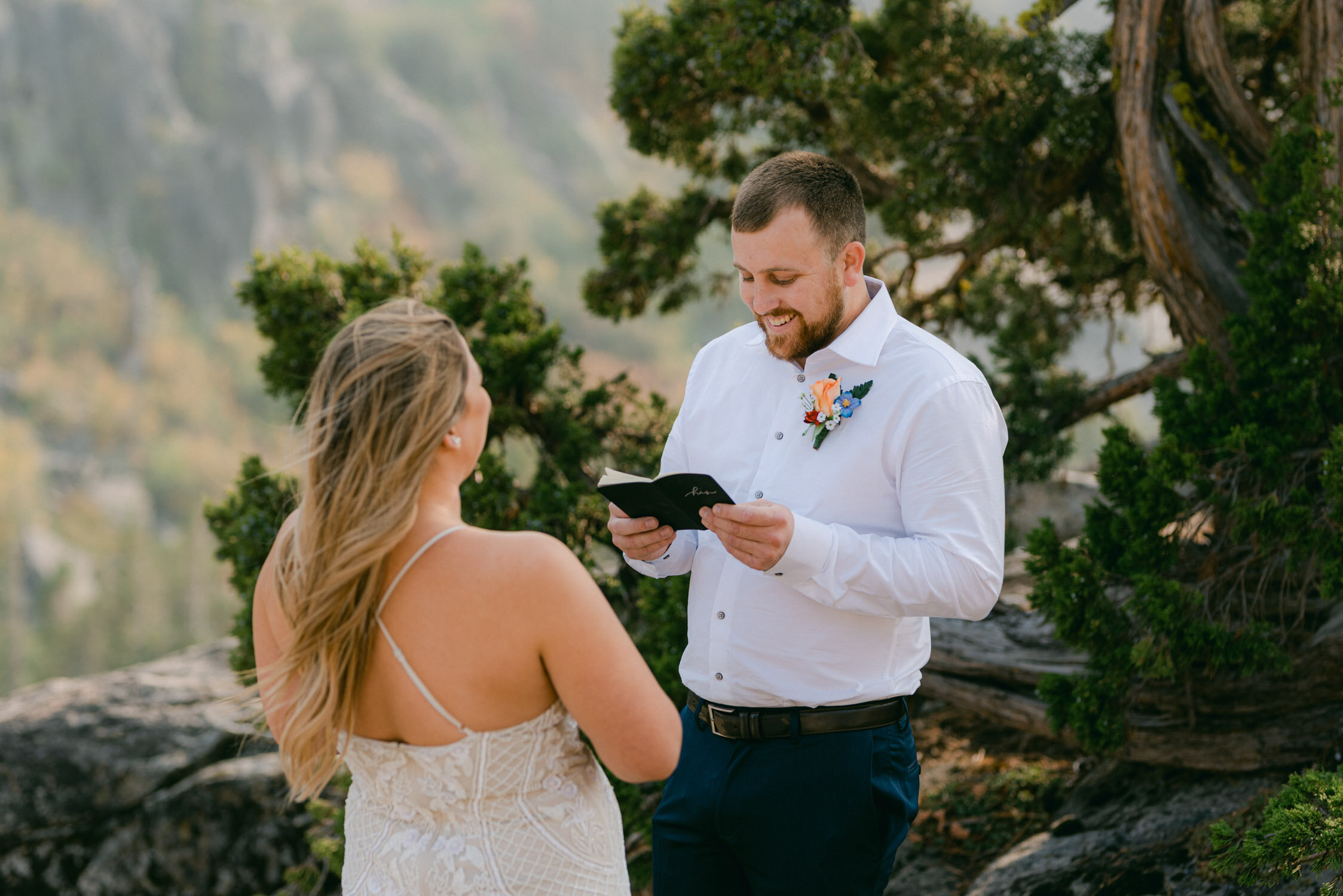 Donner Lake Elopement, photo of the groom reading his vows before the ceremony