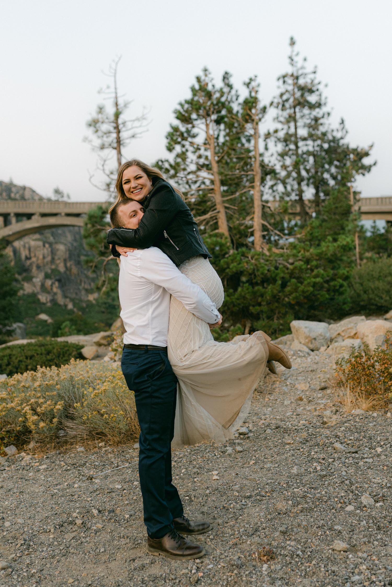 Donner Lake elopement, photo of groom picking up his bride