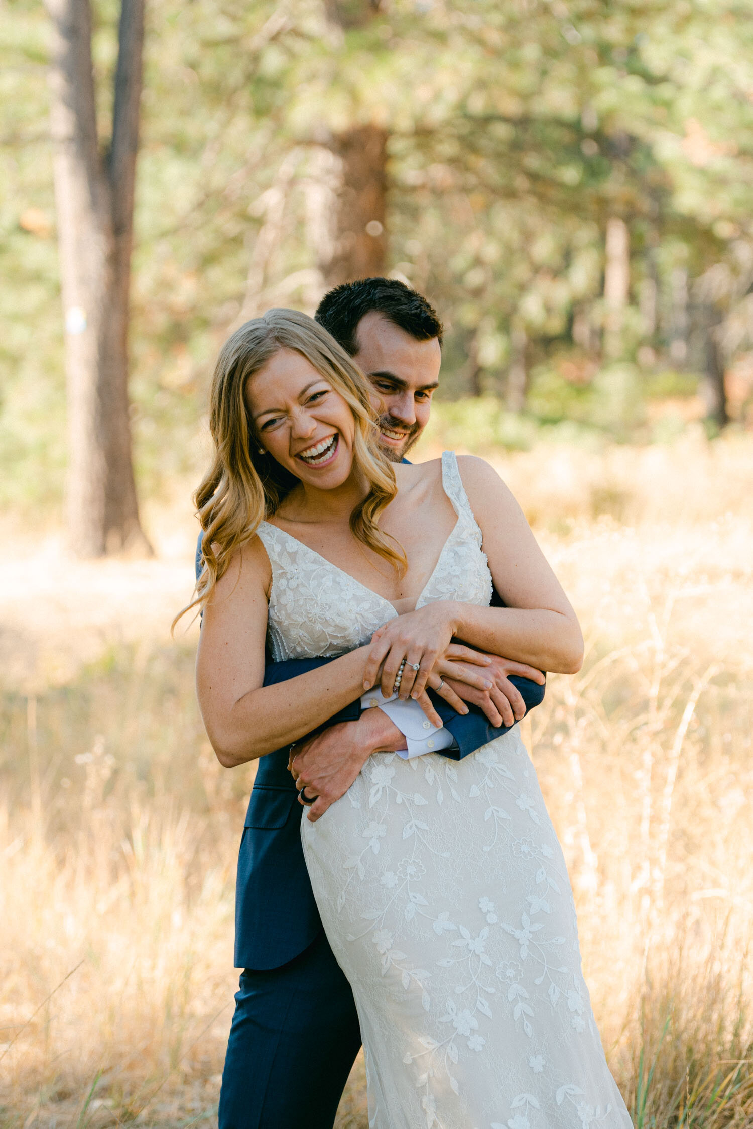 Fall Lake Tahoe wedding, photo of couple playing in the meadows