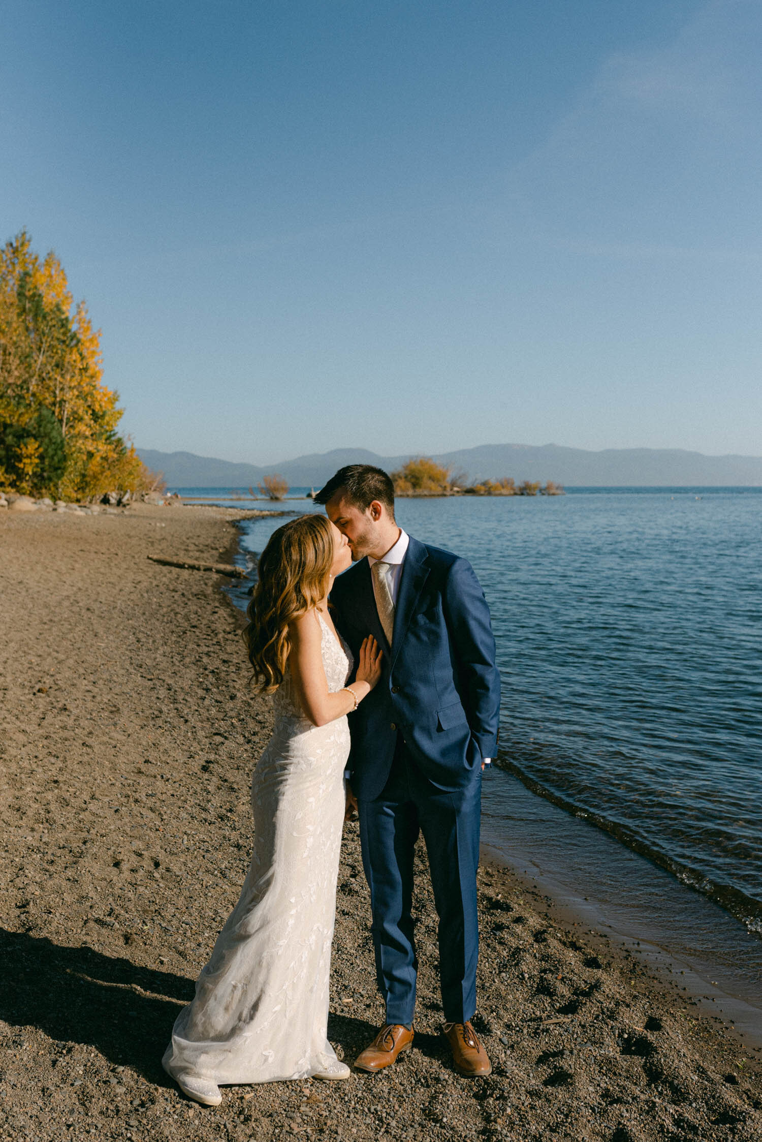 Fall Lake Tahoe wedding, photo of couple by the lake 
