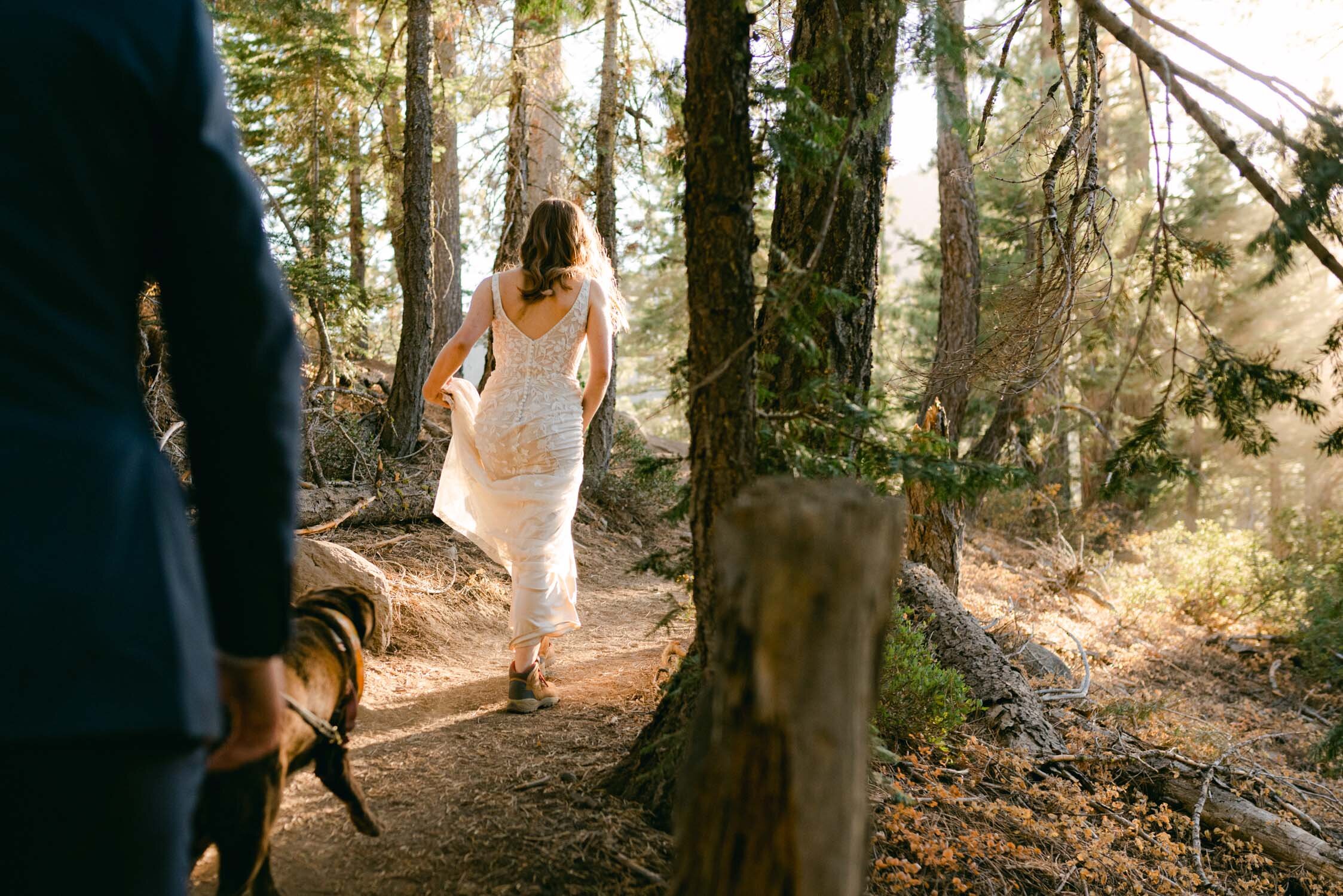 Fall Lake Tahoe elopement, bride on the trail photo