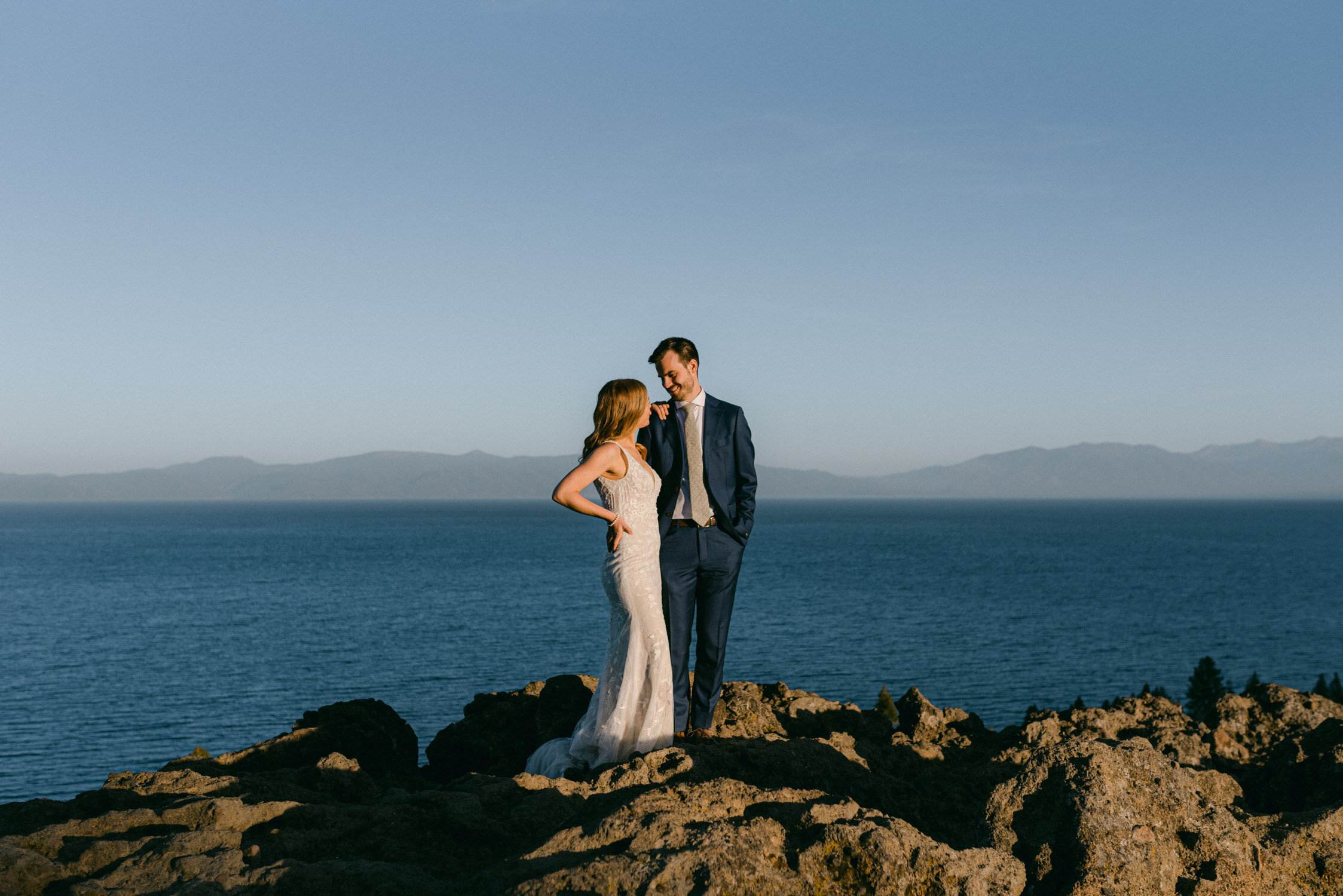 Fall elopement in Lake Tahoe, photo of couple with lake tahoe in the background