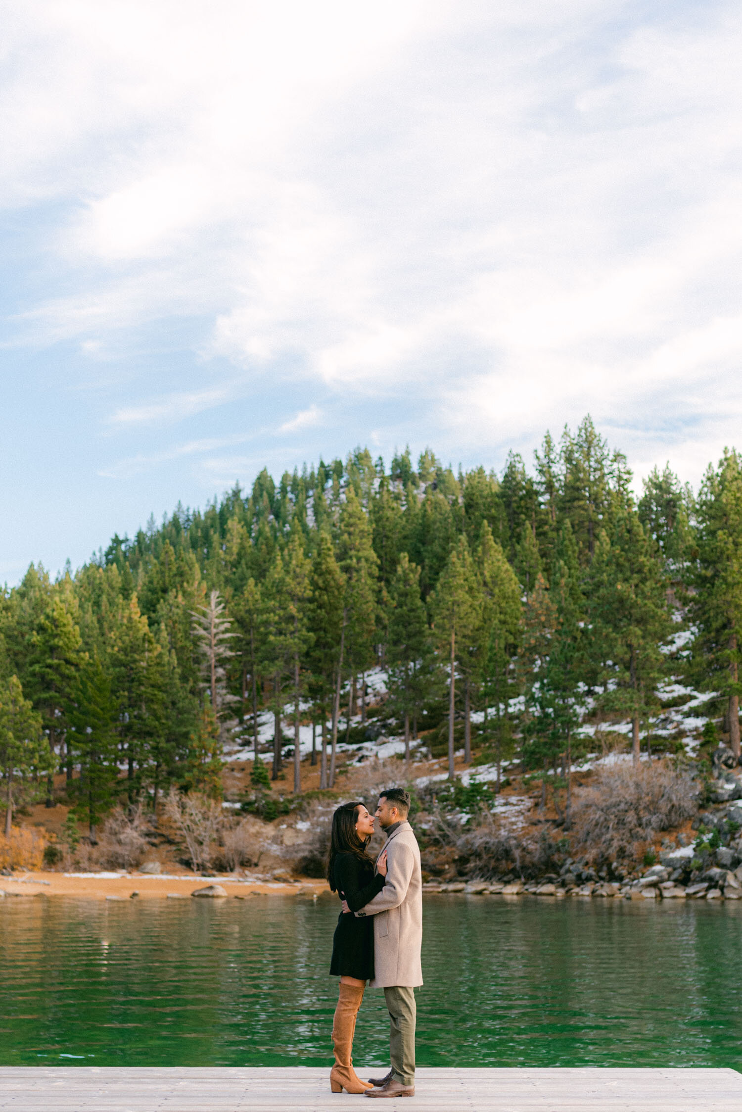 Lake Tahoe Proposal, photo of a couple with the tahoe forest in the background