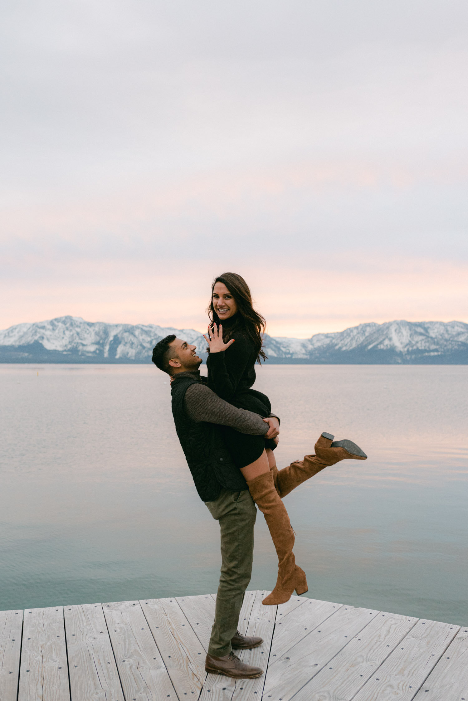 Lake Tahoe Proposal, with a surprise photographer, girl showing off her new ring