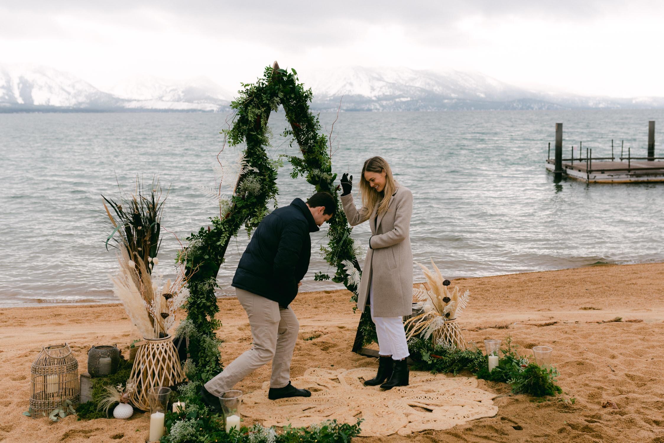 Lake Tahoe Proposal at Edgewood, photo of guy getting down on one knee to propose