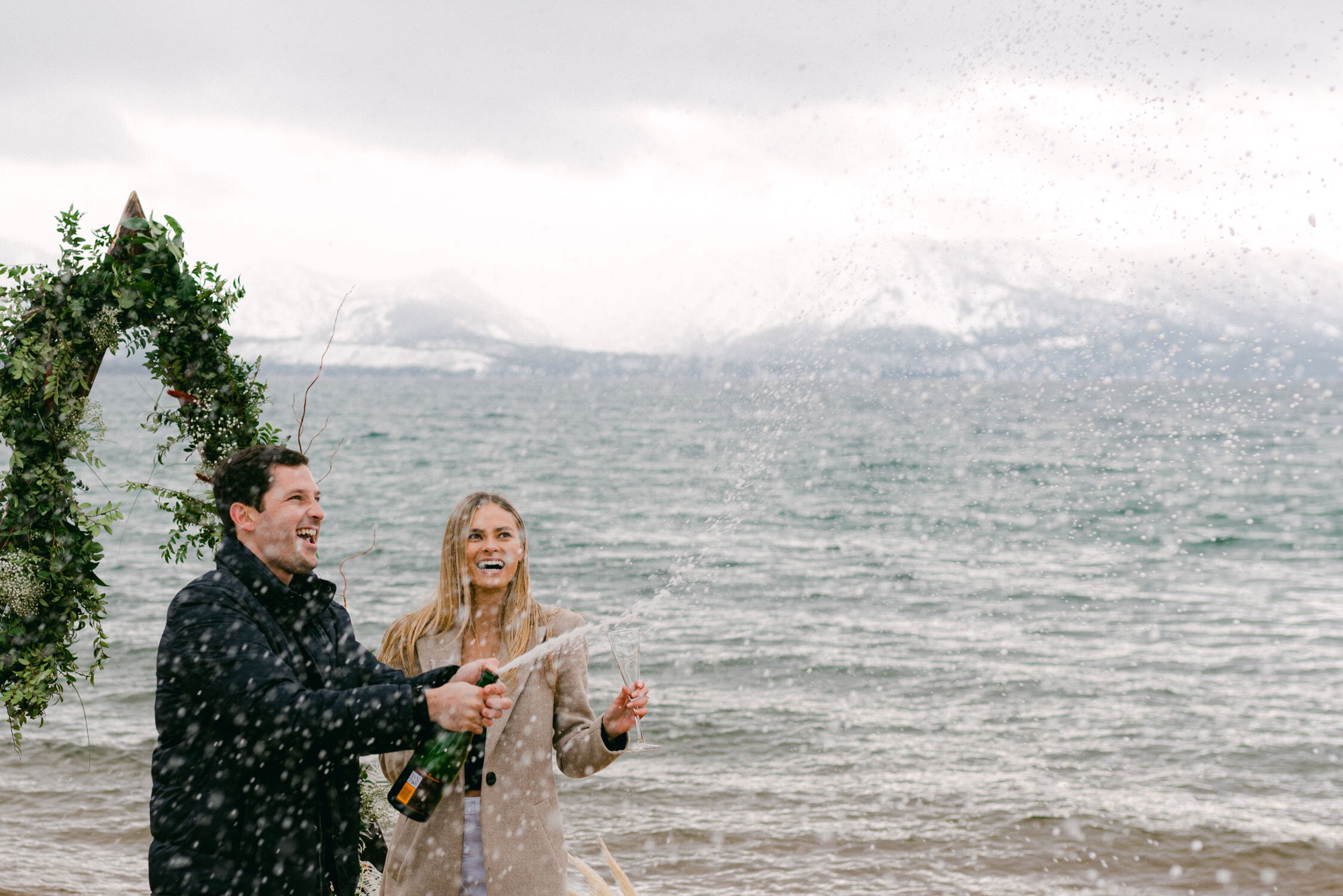 Lake Tahoe Proposal at Edgewood, photo of champagne exploding 