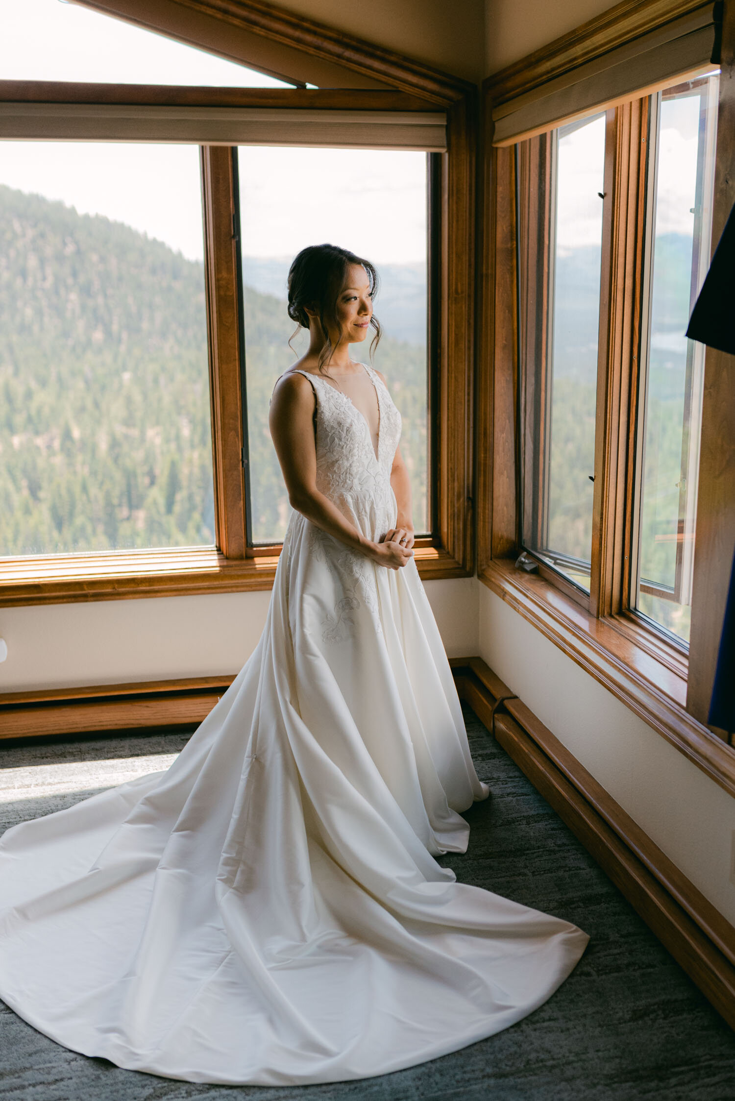 Tahoe Blue Estate Wedding photo of bride overlooking Tahoe from the master suite